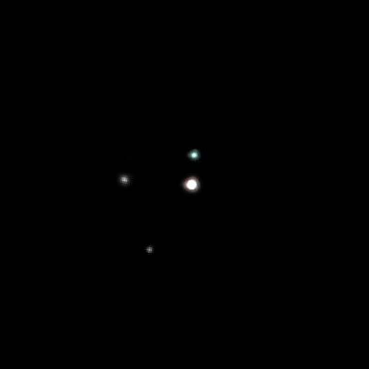 Система Плутон, фото Хаббла от 15 мая 2005 года.