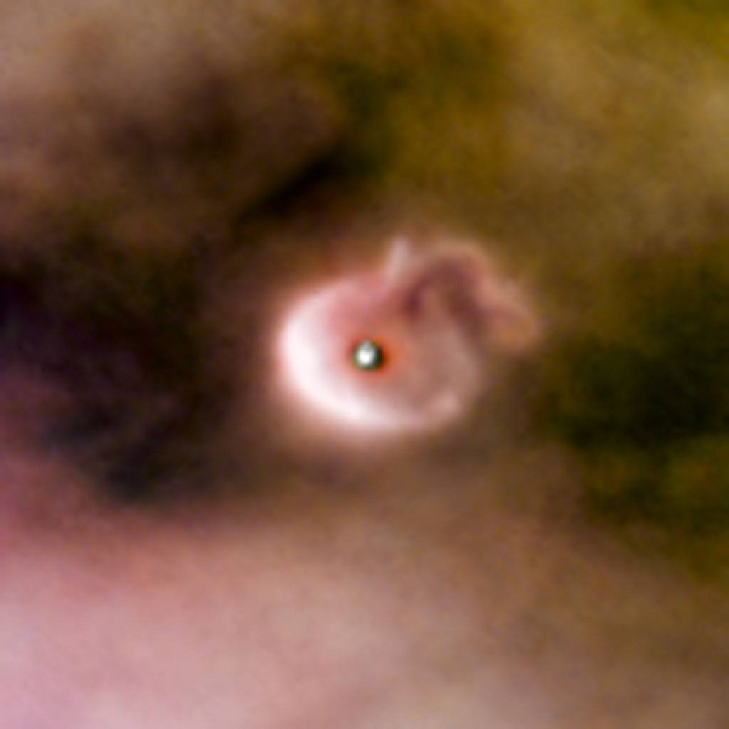 Протопланетный диск, окружающий молодую солнечную систему в туманности Ориона